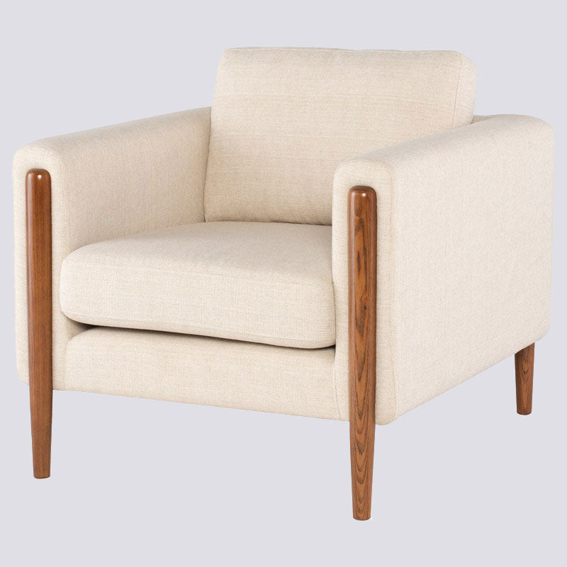 Chair
The Steen occasional chair is a classic silhouette with a refined contemporary refresh. The combination of ash wood legs, deep set into the chair arms creates a comEdge Decor Steen Occasional Chair